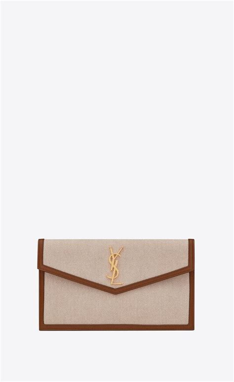 yves saint laurent pouch aw 2019|UPTOWN pouch in canvas and smooth leather .